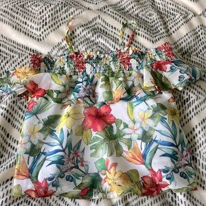 A floral top that can be worn off the shoulder or with straps.